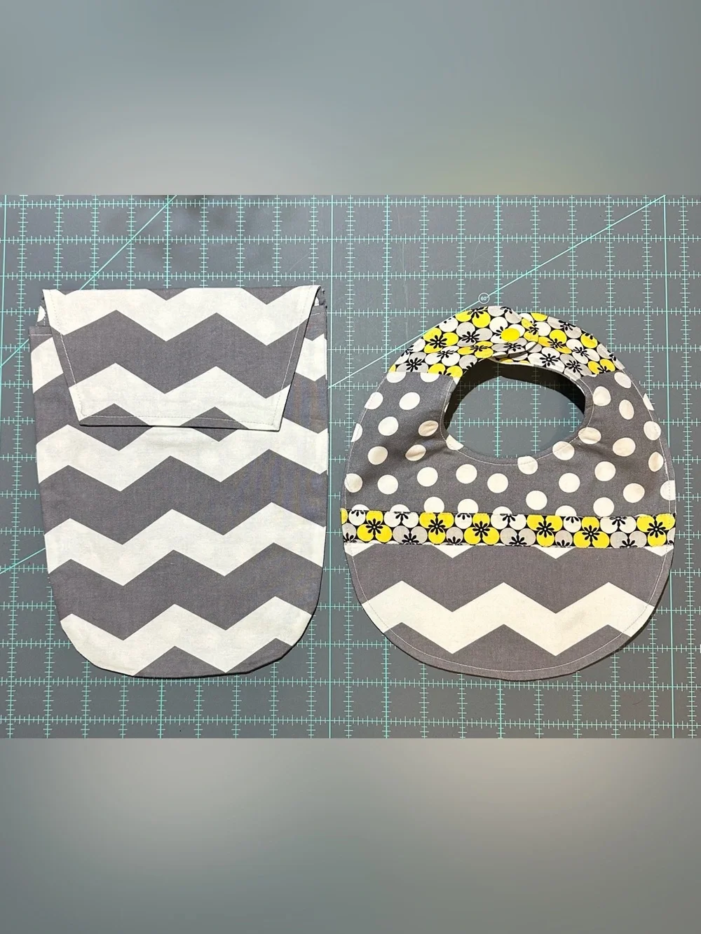 Gray Chevron Baby Bib and Diaper Pouch with Yellow Floral Accent